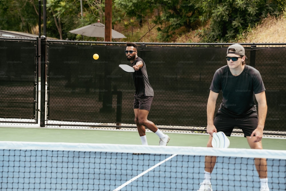 Friends laughing on court